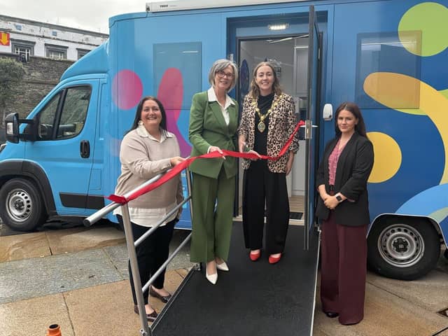 The Mayor of Derry and Strabane Grace Uí Niallais and Western Trust Chief Executive Karen Hargan with the mobile research team in Guildhall Square.