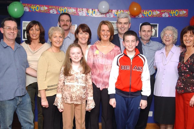 Donna Breslin with her husband Bill and the Breslin family, at Donna's 40th birthday party at the Foyle Golf Centre.                                 :Party snaps from 2003 by Hugh Gallagher