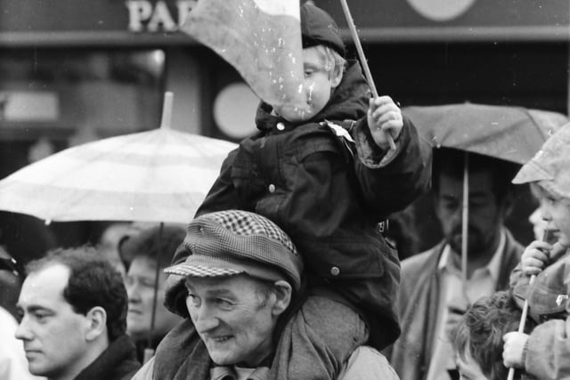 A perfect view for this young spectator at the 1993 Buncrana St. Patrick's Day parade.