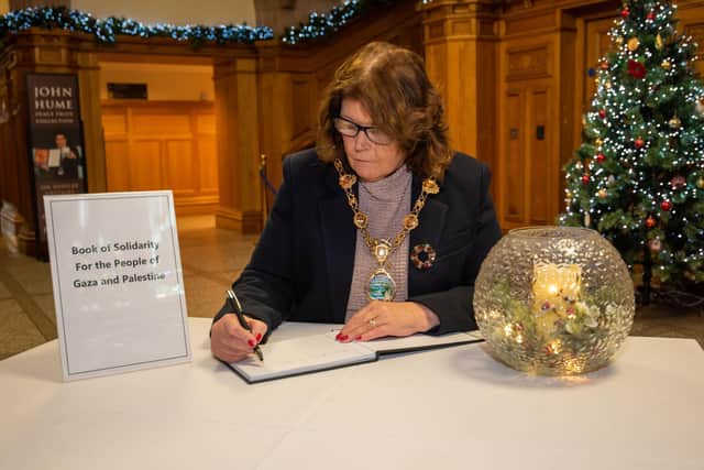 Derry City and Strabane District Council Mayor, Councillor Patricia Logue pictured as she opened a Book of Solidarity for the People of Gaza and Palestine in the Guildhall. Picture Martin McKeown. 21.12.23