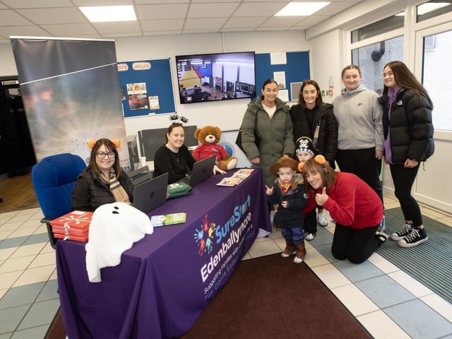 Signing in for Monday's Feile/Surestart (Edenballymore) Halloween Fun Day at the Long Tower Youth Club. (Photos: JIm McCafferty Photography)