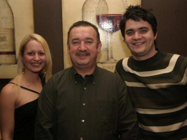 Tony smiles for the camera with his son Tony and his girlfriend Sam 0023/JML : Parties and celebrations January 2006: Tony Devlin.