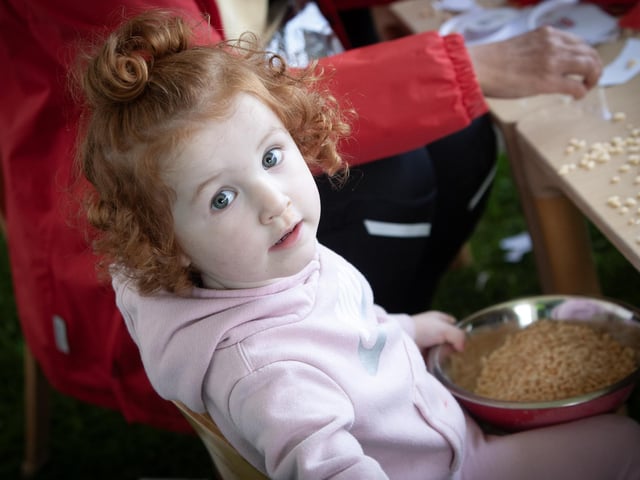 Fun and games for this young lady with some rice krispies at the Big Family Night Out in Creggan. (Photos: Jim McCafferty Photography)