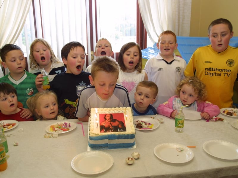 Jack blows out his candles with help from his friends