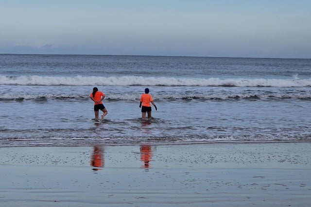 Braving the water.