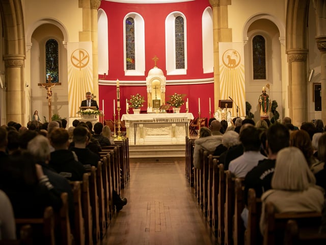Mr. Donal Chambers, Head of Year, addressing the congregation at Thursday's Annual Valedictory Mass in St. Patrick's Church, Pennyburn. : .