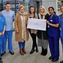 ICU staff members are pictured accepting this incredible donation from the Hegarty family. Aine Allen, Michael McGinley, Sr Stella Jojo and Ciara Legg with Daniel’s mum Michelle Hegarty and his sisters Sara-Jane and Cherish.