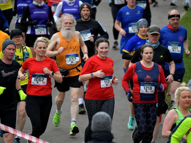 Louise Wilkinson (1062), STAR Running Club, George Row (557) and Enya Quigley (1131), STAR Running Club, make their way through St Columb’s Park during the Bentley Group Derry 10 Miler road race on Saturday morning. Photo: George Sweeney. DER2310GS – 101