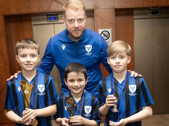 2015s Oxford United Main prizewinners pictured with coach Conor Gallagher. From left, Dara Burke, Jake Hargan and Darragh Donaghey. (Photos: Jim McCafferty Photography)