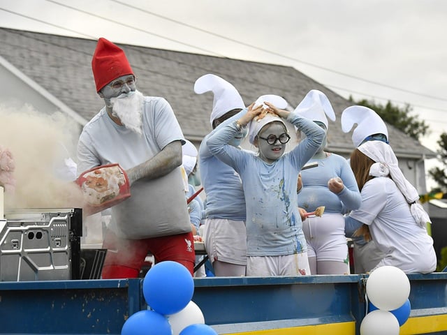 Muff Feile opening parade makes its way through the village on Friday evening. Photo: George Sweeney