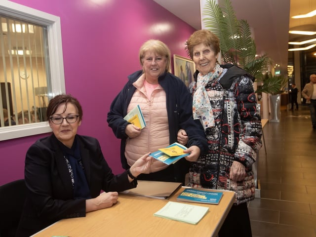 Joanne Barr, Derry Credit Union pictured with some members at the AGM. : .