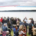 The Red Arrows dazzle spectators with their diamond nine aerobatic display across the shores of Belfast Lough