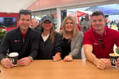Siobhán Moran, second from right, and Gemma Cahoon, second from left, Business Development Manager at HSCB, with Tim Henman and Brian O'Driscoll in the HSCB Clubhouse at The Open in Portrush