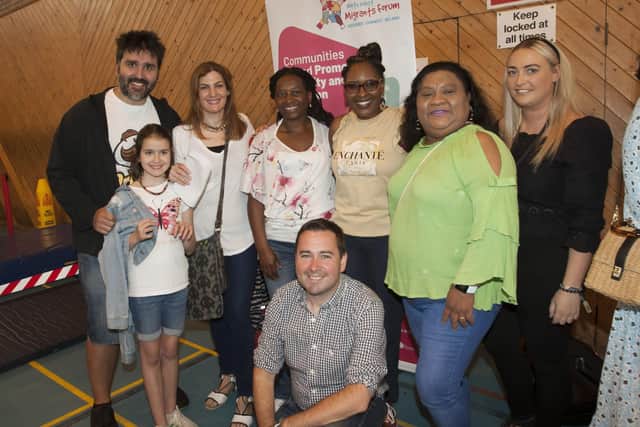 Lilian Seenoi-Barr, Director, North West Migrants Forum pictured with some of the Forumâ€™s staff and families during Saturdayâ€™s Fun Day.