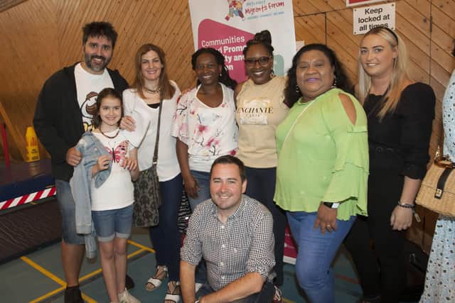 Lilian Seenoi-Barr, Director, North West Migrants Forum pictured with some of the Forum’s staff and families during Saturday’s Fun Day.