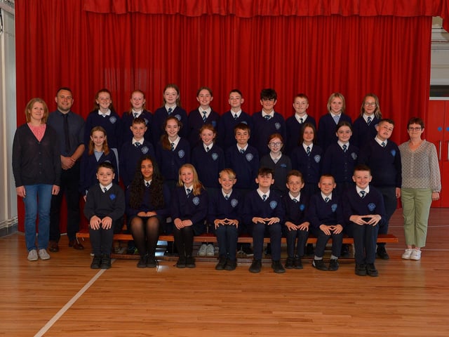 P7 leavers class at Rosemount Primary School pictured with Miss Friars, classroom assistant, Mr Quinn, teacher, and Mrs Stewart, teacher. Photo: George Sweeney. DER2320GS – 79