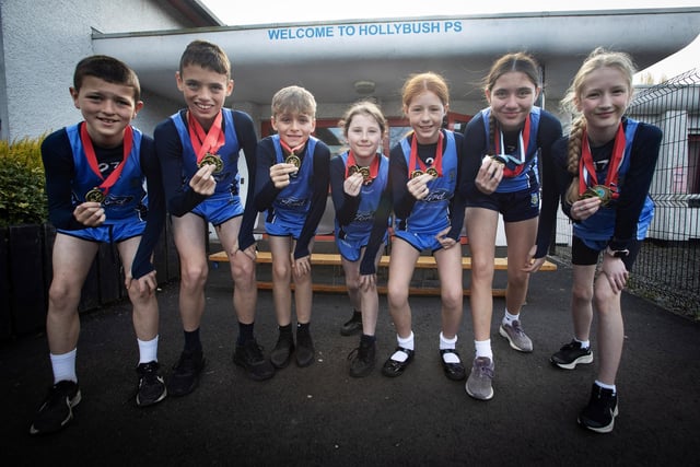 Cross country medal winners at Hollybush P.S. this year. From left, Noah Lavery, Paul Devine, Harry Connolly, Caoimhe Walsh, Aoife O Donnell, Maria Devine and Maeve O'Donnell.