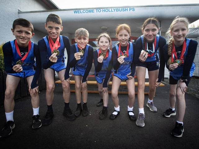 Cross country medal winners at Hollybush P.S. this year. From left, Noah Lavery, Paul Devine, Harry Connolly, Caoimhe Walsh, Aoife O Donnell, Maria Devine and Maeve O'Donnell.