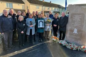 Republicans join the family and friends of Joe Walker at the Republican Monument in Central Drive.