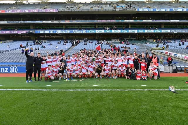 Derry U20 players and management celebrate their All Ireland Under 20 'B' Championship victory in Croke Park.