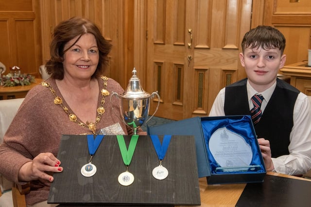 Twelve years old Jacob Laird from Bready Ulster Scots Pipe Band has been recognised by the Mayor Councillor Patricia Logue after he was crowned Ulster, All Ireland and World Champion solo snare drum champion. Picture Martin McKeown.