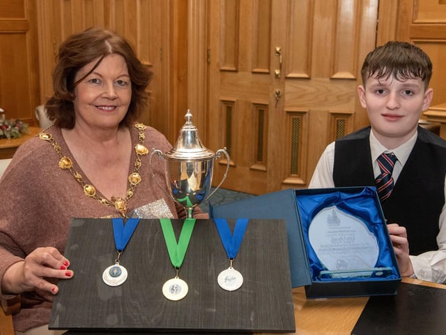 Twelve years old Jacob Laird from Bready Ulster Scots Pipe Band has been recognised by the Mayor Councillor Patricia Logue after he was crowned Ulster, All Ireland and World Champion solo snare drum champion. Picture Martin McKeown.