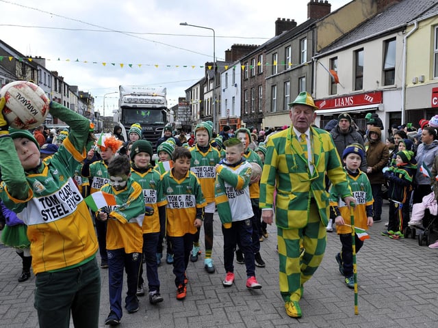 Buncrana St Patrick's Day parade and events: There will be lots of floats, bands and attractions around Inishowen's largest town for the festivities this year. There will kids' activities before and after the parade, while pubs are hosting live music, and there will be band playing in the Market Square from 1pm to 2.30pm ahead of the parade setting off at 3pm along the usual route. Pictured at a previous Buncrana St Patrick's Day parade are John Porter (right) with young Buncrana GAA players. DER1118GS028
