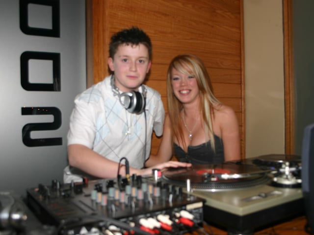 Bother Garth gives birthday girl Kirsten a go at the Decks. 2296/dd