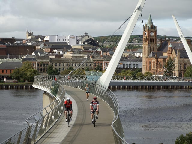 Men's winner Kyle Doherty (Spartans) makes his way over the Peace Bridge.