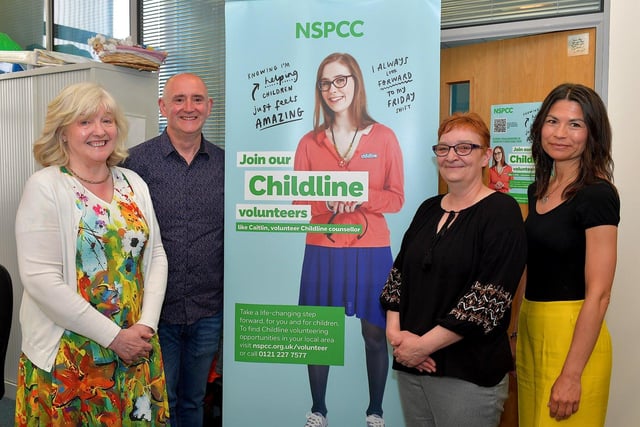 Pictured at the Childline Foyle open day, held in the Derry office recently are (from left) Donna Cartin, volunteer, Cormac Nolan, Service Head for Childline Foyle and Cardiff online services, Donna Fulton, Childline Foyle supervisor and Magdalena Barioza-Karwacka, volunteer. Photo: George Sweeney. DER2321GS - 42