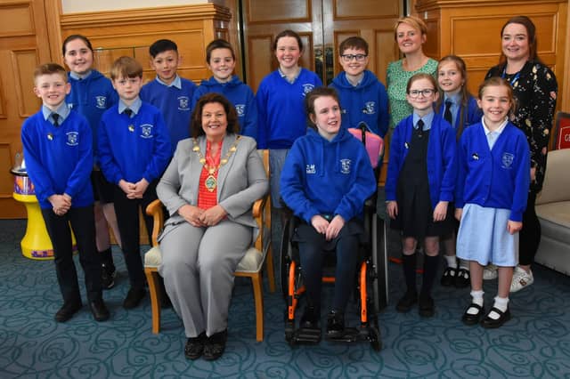 Nazareth House PS School Council pictured with the Mayor of Derry City and Strabane District Council when they visited the Guildhall recently. Included is Principal Mrs. Roisin Blackery and Mrs Emma Courtney.