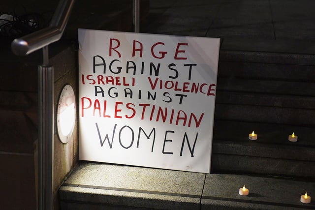 Placard placed on the steps of the Guildhall on Friday evening remembering all victims and survivors of violence against women and girls. Photo: George Sweeney