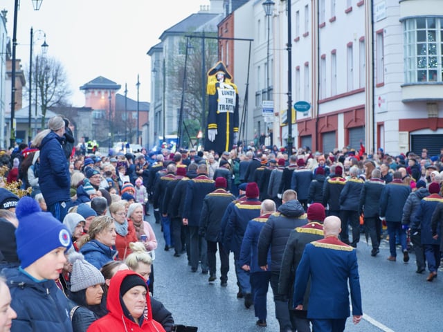 'Lundy the traitor' standing in Bishop Street before it was set on fire on Saturday.