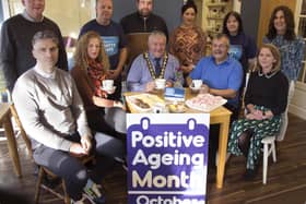Pictured at the launch of the Chatty Café at Curran’s Bakery and Coffee Shop in Greysteel are front row (L-R) Liam Hinphey, Age-Friendly Co-ordinator, Catherine Farrimond, Community Development Officer, the Mayor of Causeway Coast and Glens Borough Council, Councillor Ivor Wallace, coffee shop customer Davie and Gabrielle Quinn, Causeway Coast and Glens Council Loneliness Network. Back row (R-L): Maureen Duffy, GP Federation Western Trust; Siobhan Curran, Coffee Shop owner, Tori Calderwood, COAST & Causeway Loneliness Network, Columba Mailey, Vale Centre Manager, Felim Curran, coffee shop owner and Councillor Dermot Nichol.