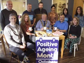 Pictured at the launch of the Chatty Café at Curran’s Bakery and Coffee Shop in Greysteel are front row (L-R) Liam Hinphey, Age-Friendly Co-ordinator, Catherine Farrimond, Community Development Officer, the Mayor of Causeway Coast and Glens Borough Council, Councillor Ivor Wallace, coffee shop customer Davie and Gabrielle Quinn, Causeway Coast and Glens Council Loneliness Network. Back row (R-L): Maureen Duffy, GP Federation Western Trust; Siobhan Curran, Coffee Shop owner, Tori Calderwood, COAST & Causeway Loneliness Network, Columba Mailey, Vale Centre Manager, Felim Curran, coffee shop owner and Councillor Dermot Nichol.