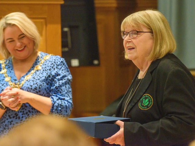 The Mayor Councillor Sandra Duffy pictured with Musicial Director, Sheila Carlin as she welcomed the members of Colmcille Ladies Choir to a reception in the Guildhall as they mark their 50th Anniversary. Picture Martin McKeown. 20.01.23:.