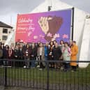 INTERNATIONAL WOMEN'S DAY. . . . .Group pictured on Tuesday at the launch of the International Women's Day banner at Free Derry Corner. The launch culminated in a number of events throughout the city over the week. (Photos: Jim McCafferty Photography)