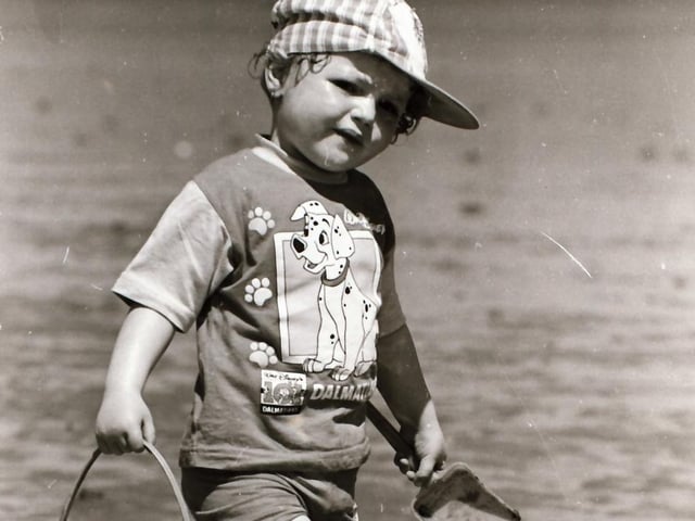 An industrious sand castle builder at Lisfannon in June 1995.