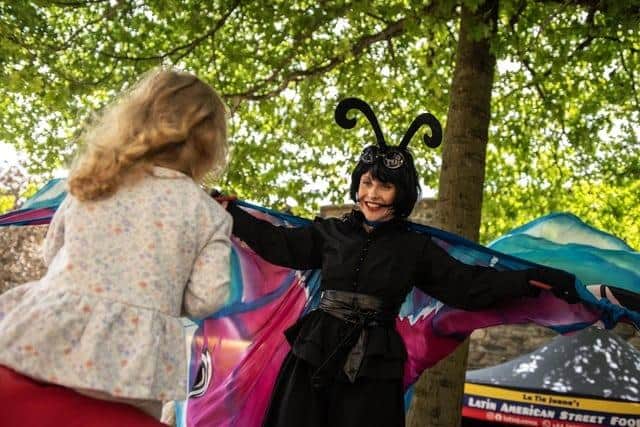 In Your Space Circus Butterfly  pictured at the Carnival of Colours festival. Photo: Conall Malarkey, Nerve Centre