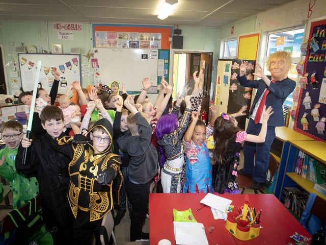 Donald Trump holding a protest in Ms. Pike's P4 class on Friday. : .