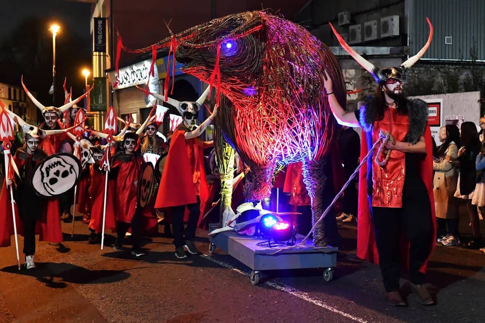 The ‘Carnival of the Dead’ Halloween parade makes its way along Strand Road.  Photo: George Sweeney