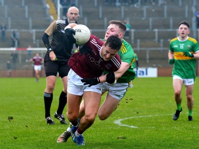 Slaughtneil’s Christopher Bradley is tackled by Glen’s Ethan Doherty during the Derry SFC final at Celtic Park on Sunday afternoon. DER2243GS - 007