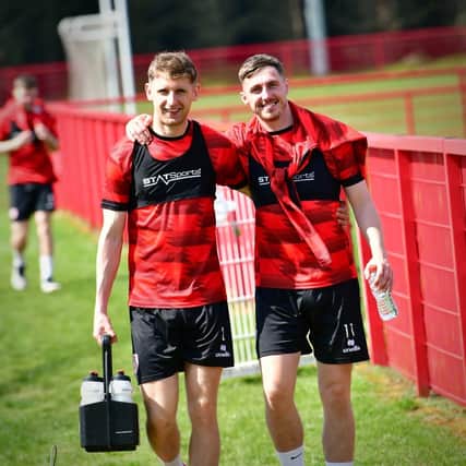 ALL SMILES . . . Gavin Whyte, pictured with Ronan Boyce, is loving life with Derry City. Photograph by Kevin Morrison.