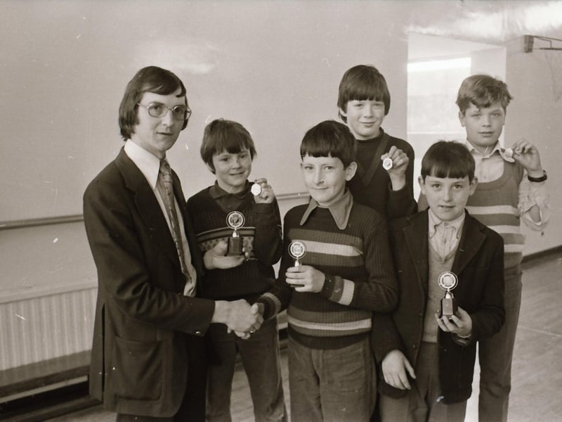 Mr Desmond Rainey Rosemount Primary School Junior Club organiser, presenting the presenting club snooker and table tennis awards to Sean Murray, with runners up also pictured.