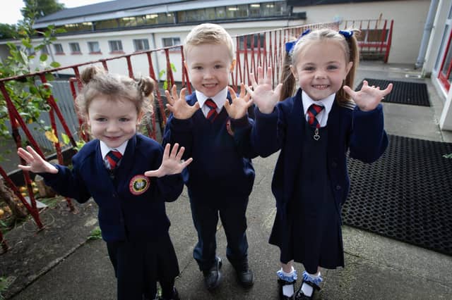 Happy Little P1s at Holy Child Primary School, Creggan pictured this week - From left, Suzie, LJ and Rua. (Photos: Jim McCafferty Photography)