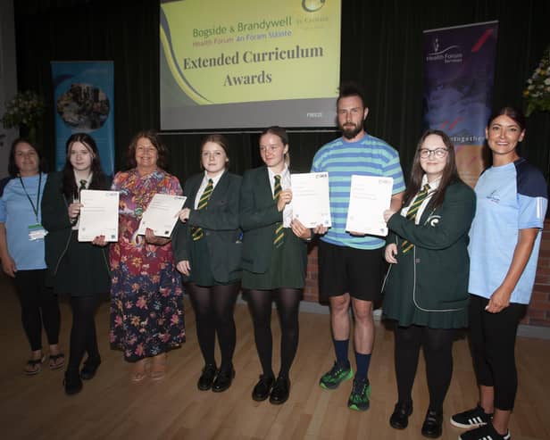 The Mayor, Patricia Logue and Danny Quigley presenting OCN Certificates to students from Class 8507 at St. Cecilia’s College on Thursday afternoon.
