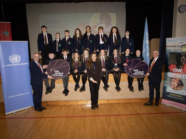 Guest speaker Emer Rafferty, a delegate from the 'One Young World Summit 2023' who gave a talk to students from Oakgrove and Lisneal Colleges at the school pictured with students who took part from both schools. Included are Mr. John Harkin, principal, Oakgrove and Mr. Michael Allen, principal, Lisneal College.