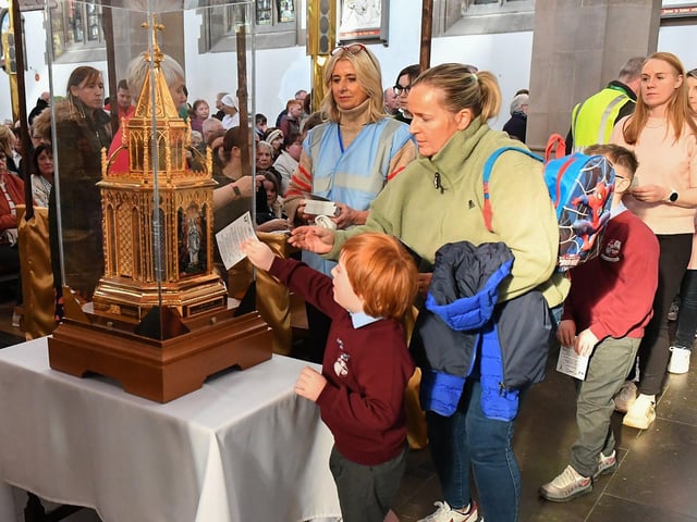 Pupils from the Derry Diocese queue for the veneration of the relics of St Bernadette at St Eugene’s Cathedral on Monday morning. Relics of the saint are being taken on pilgrimage to each of the 26 Catholic dioceses in Ireland. Photo: George Sweeney