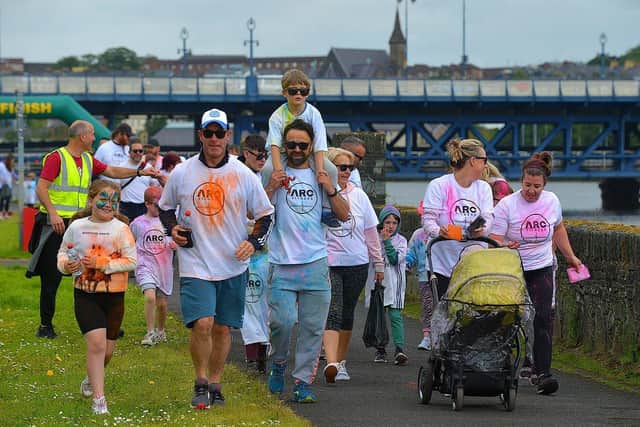 Families at a previous ARC Fitness Colour Dash back in 2022. Photograph: George Sweeney.  DER2226GS – 009