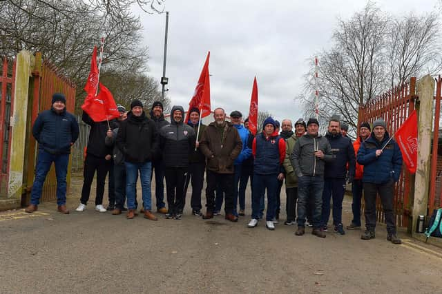 Striking Roads Services workers picket the Depart for Infrastructure Woodburn Roads depot on Crescent Road on Wednesday morning. Photo: George Sweeney. DER2310GS – 15